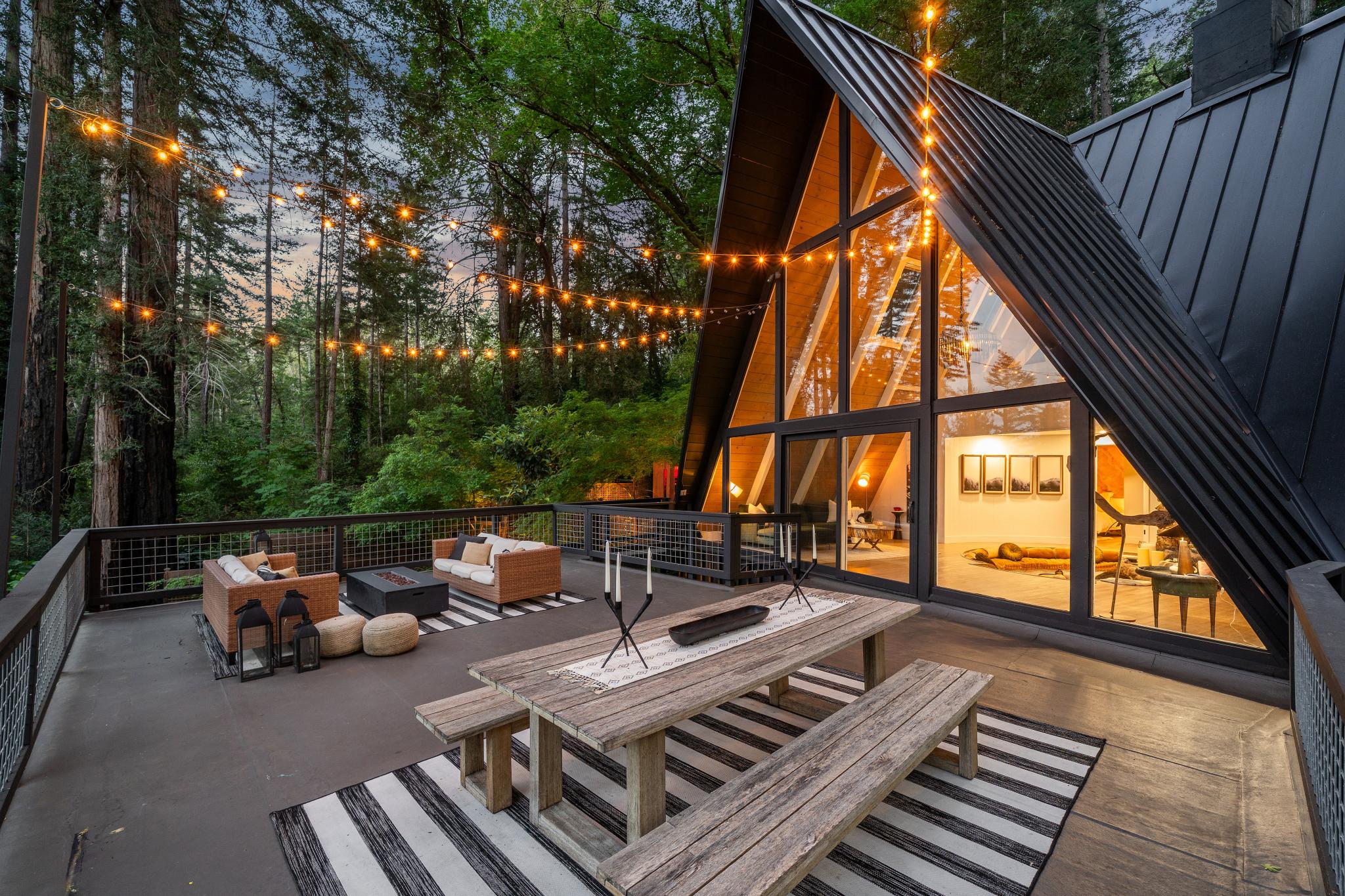 The retreat at twilight — glowing among the redwoods